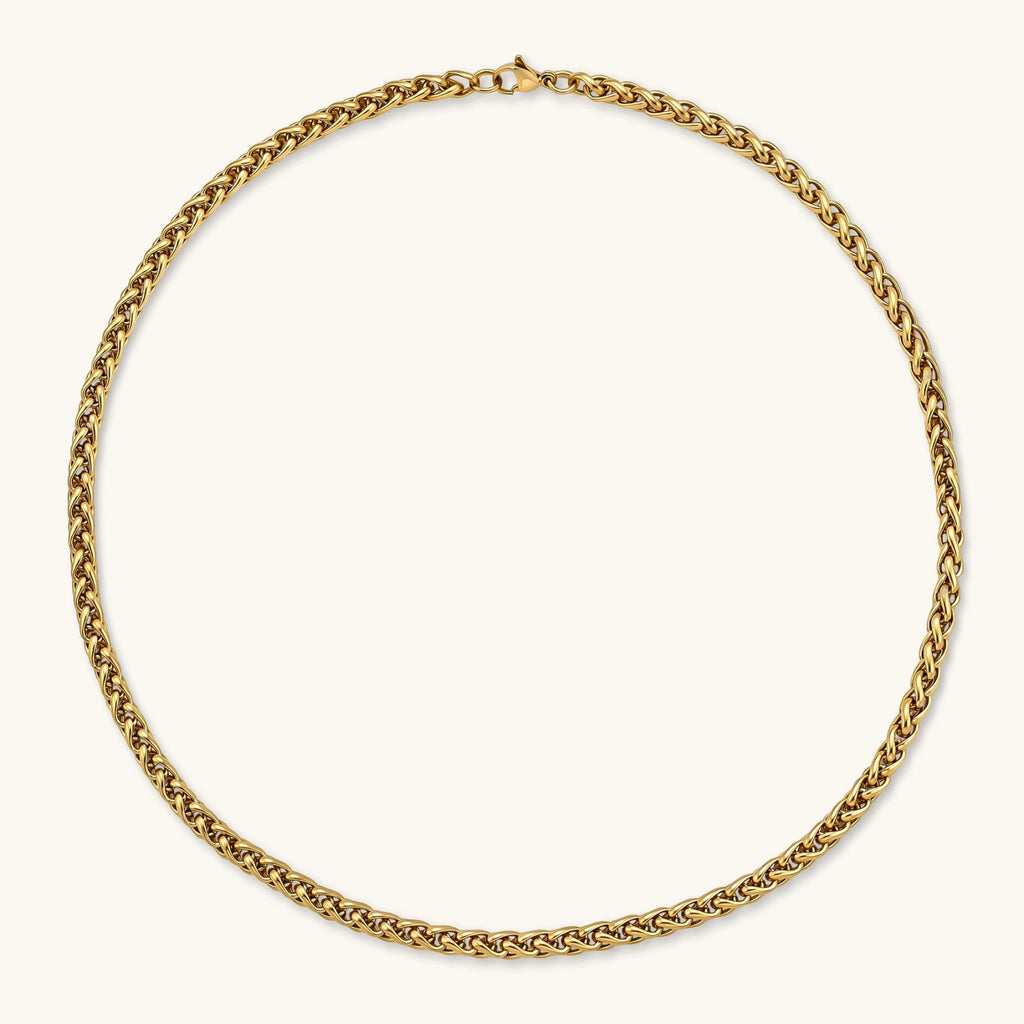 18K gold-plated stainless steel wheat chain necklace, 4.2mm wide, with lobster clasp, on off-white background.